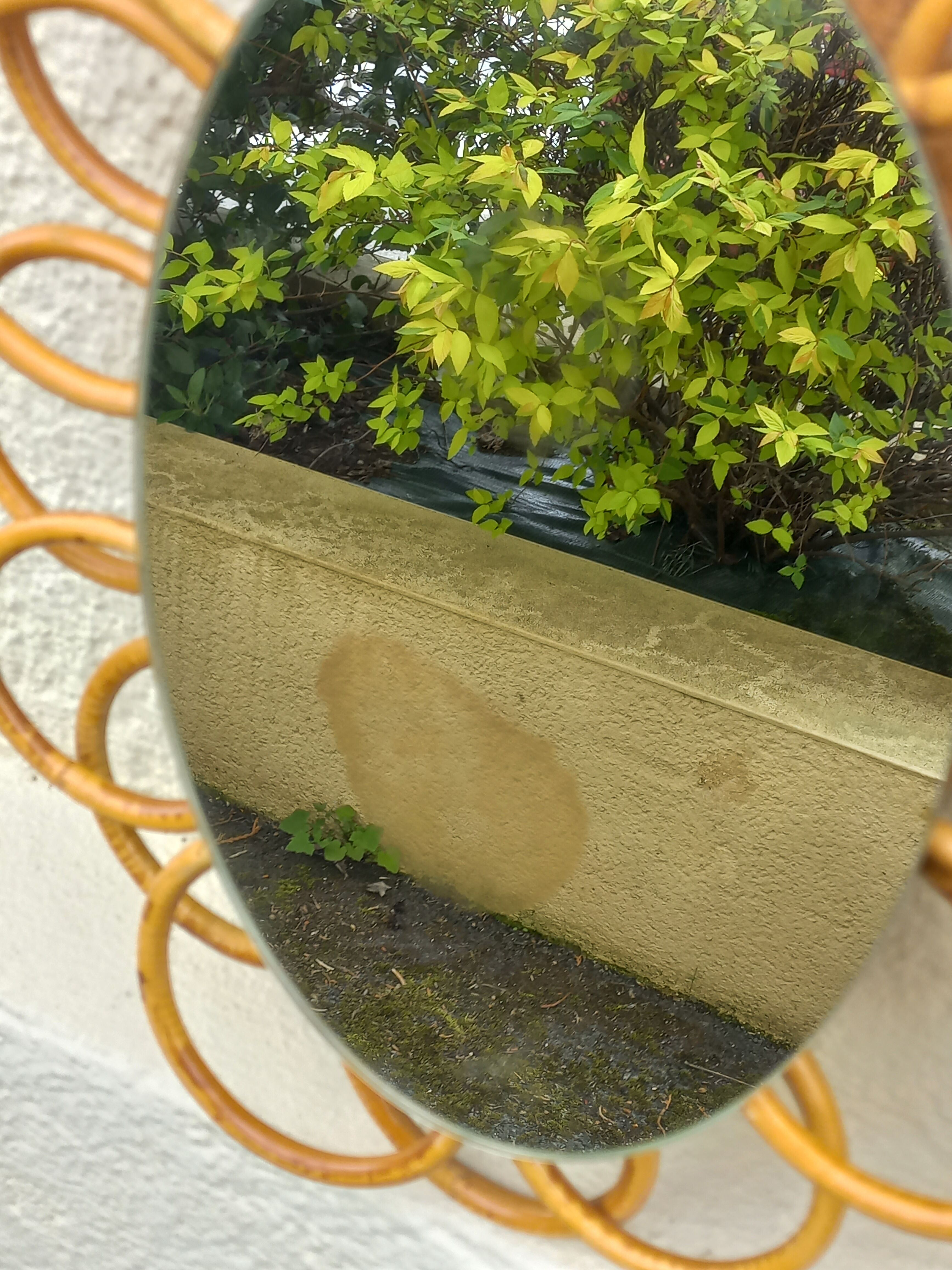 Miroir soleil ovale en rotin des années 70 25x31cm