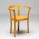 Stackable chairs in curved beech.
