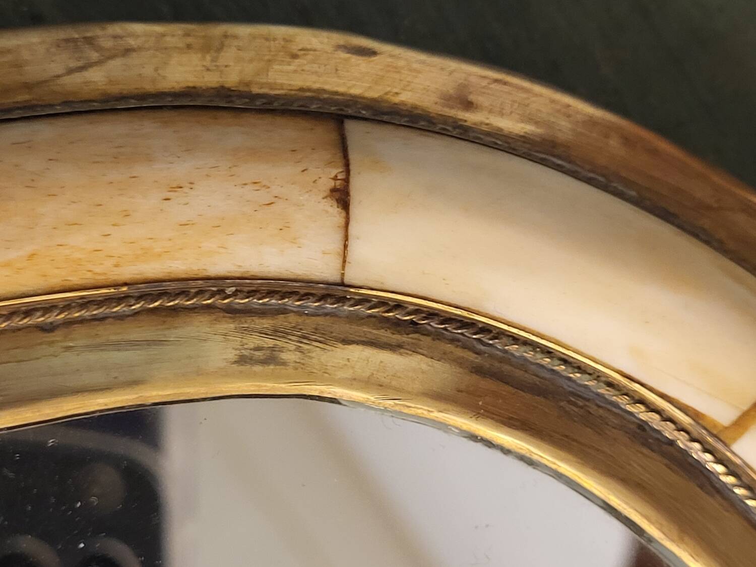 Brass and bone mirror