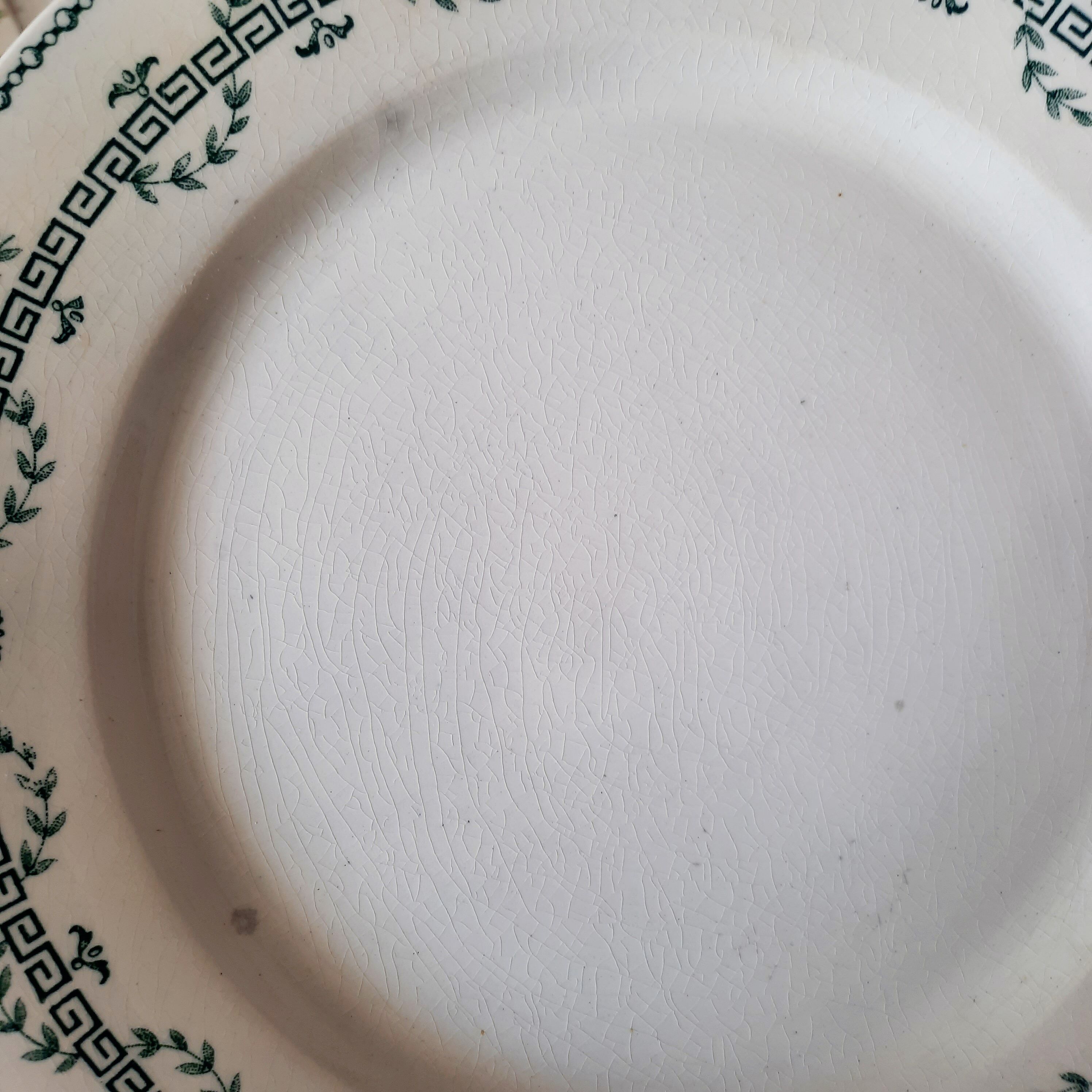 Old flat plates mismatched in earthenware