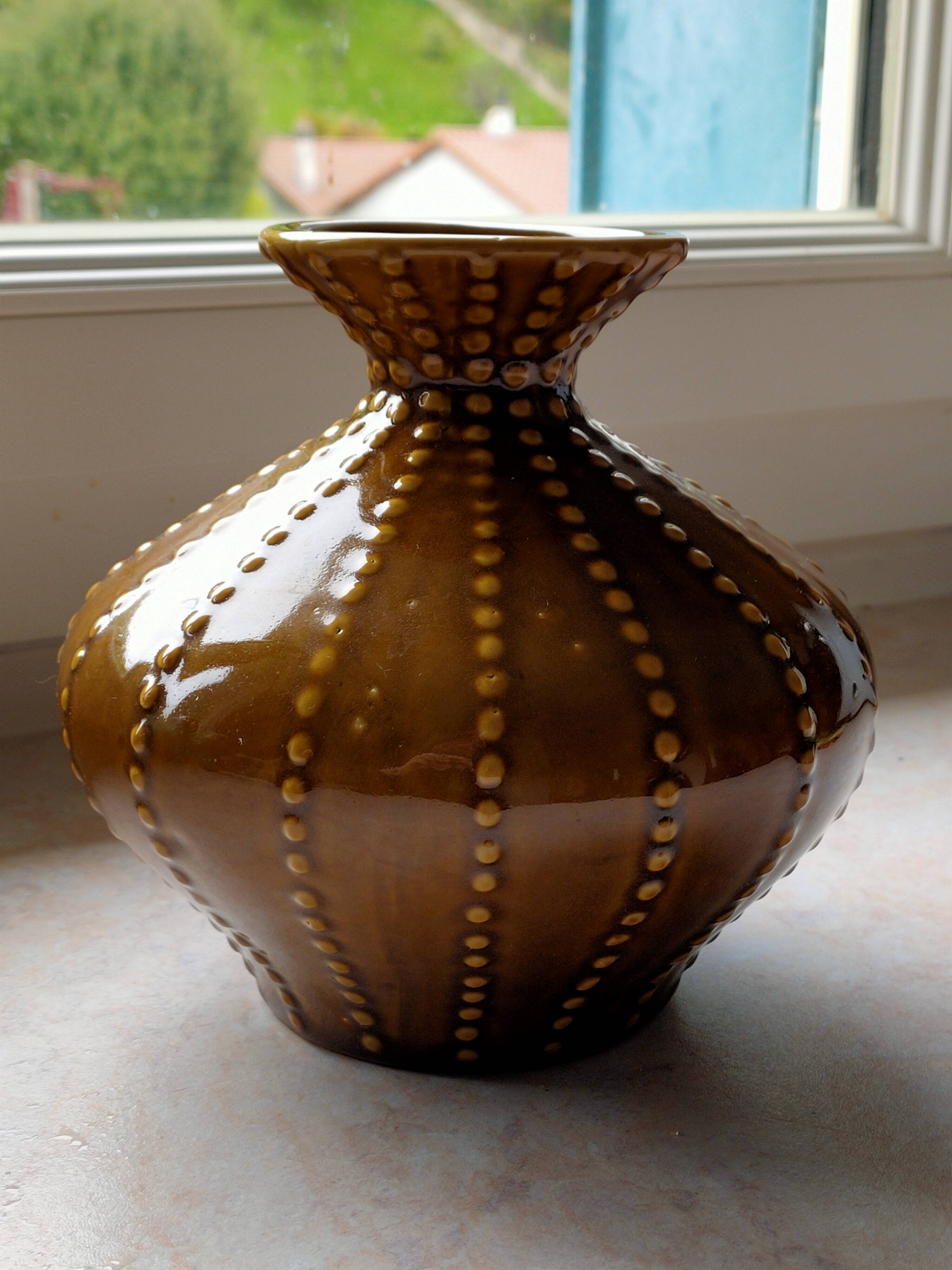 Pear-shaped ceramic vase.