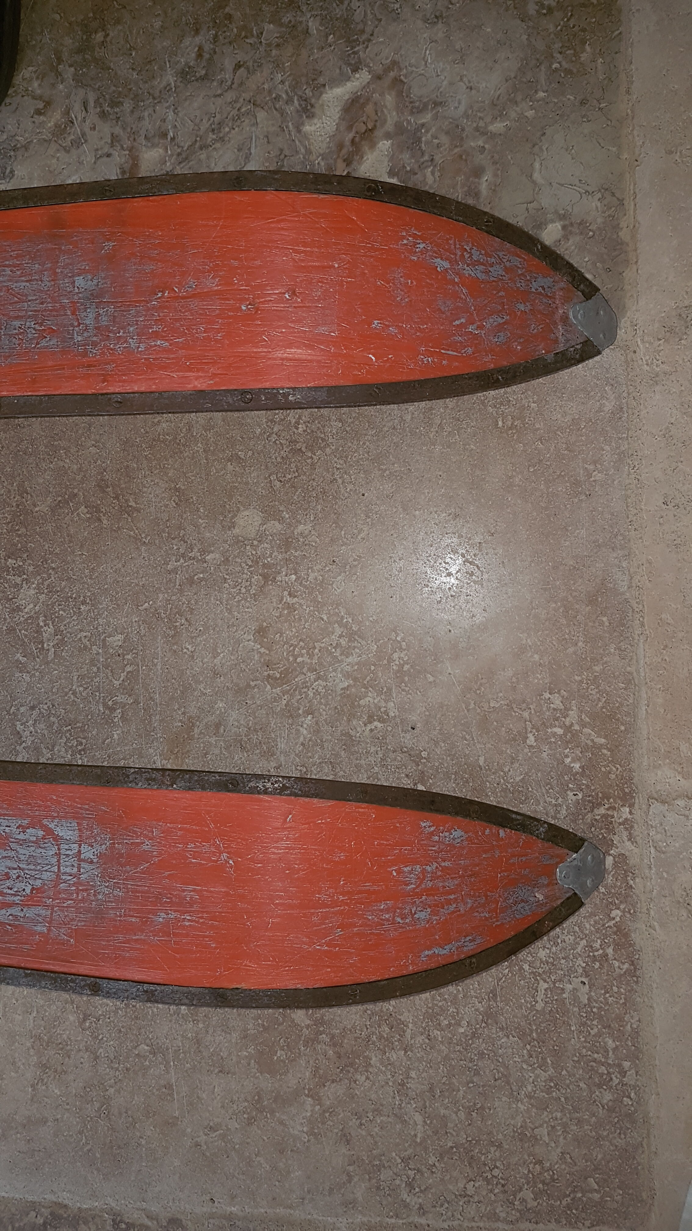 Old skis wooden and its pair of sticks