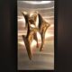 Sculptural bronze wall lamp by Fred Brouard, 1976