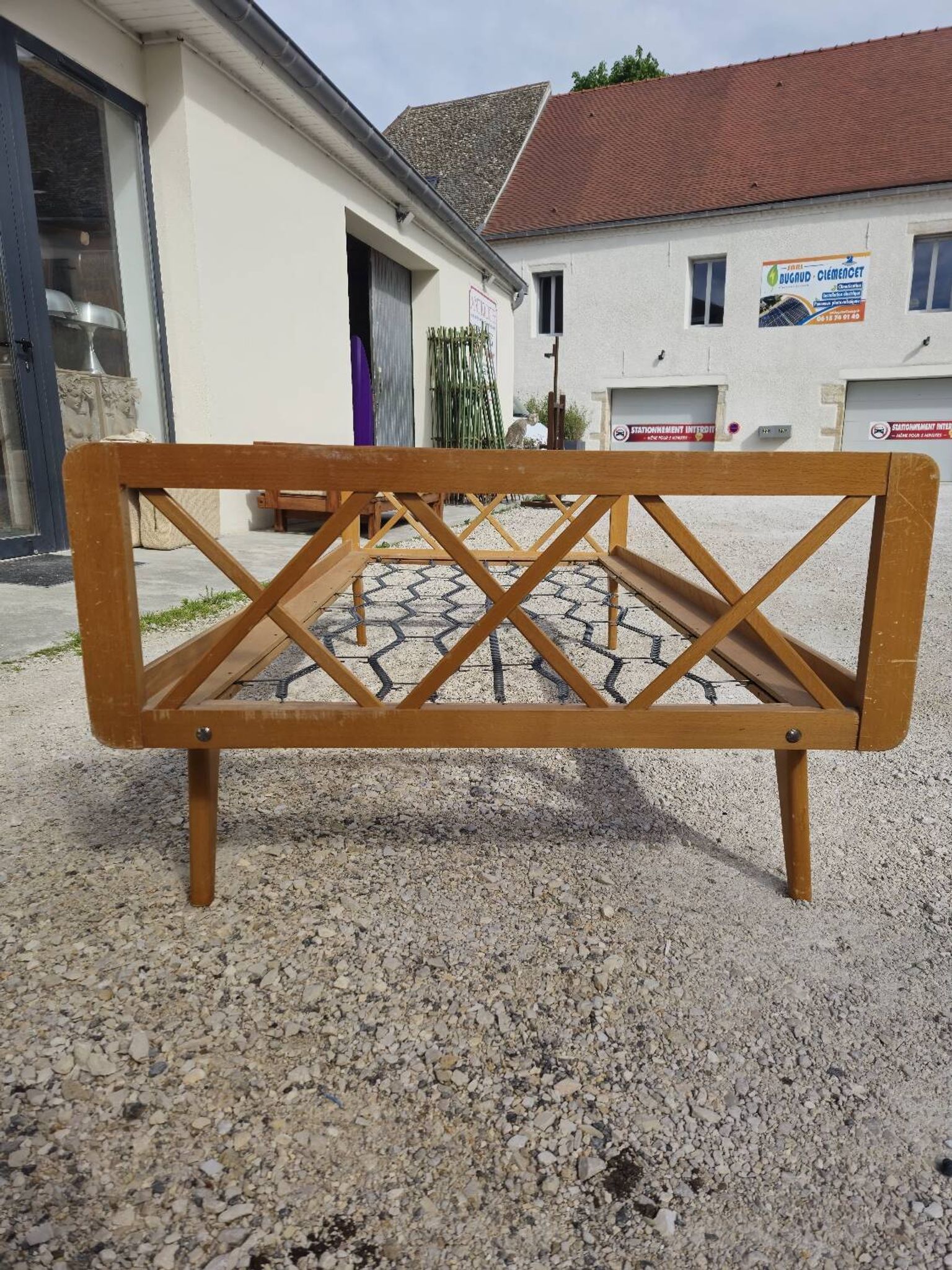 Vintage bed with compass feet from the 1950s