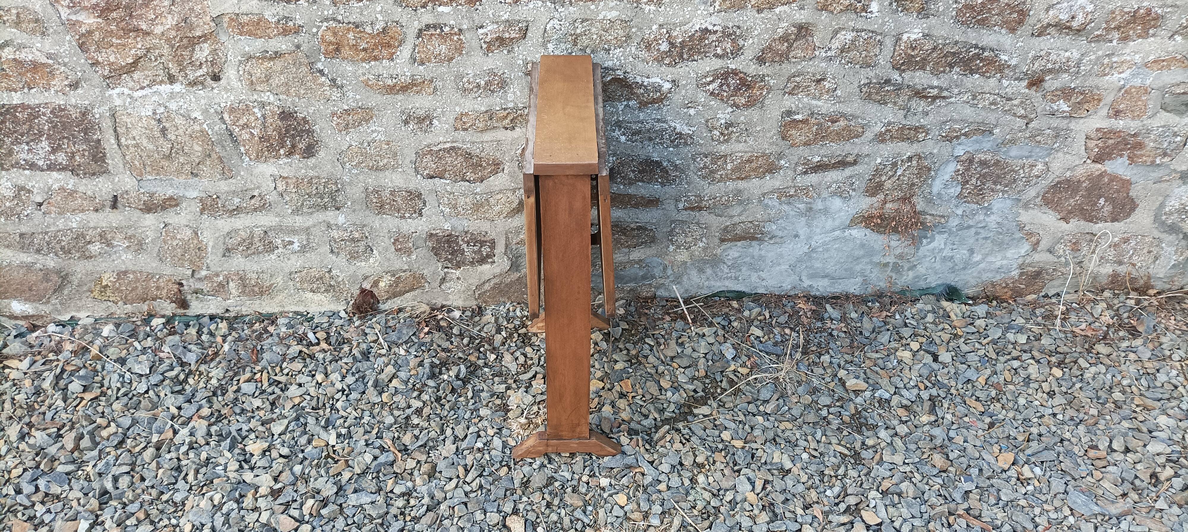 Old wooden table with double swings