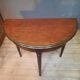 Table demi lune en acajou