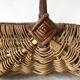 Woven wicker basket with hazelnut handle