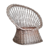 Antique armchair in gray woven wicker