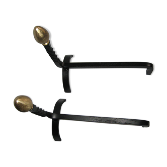 pair of twisted steel and brass channels