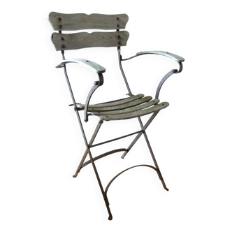Old wooden slatted garden chair