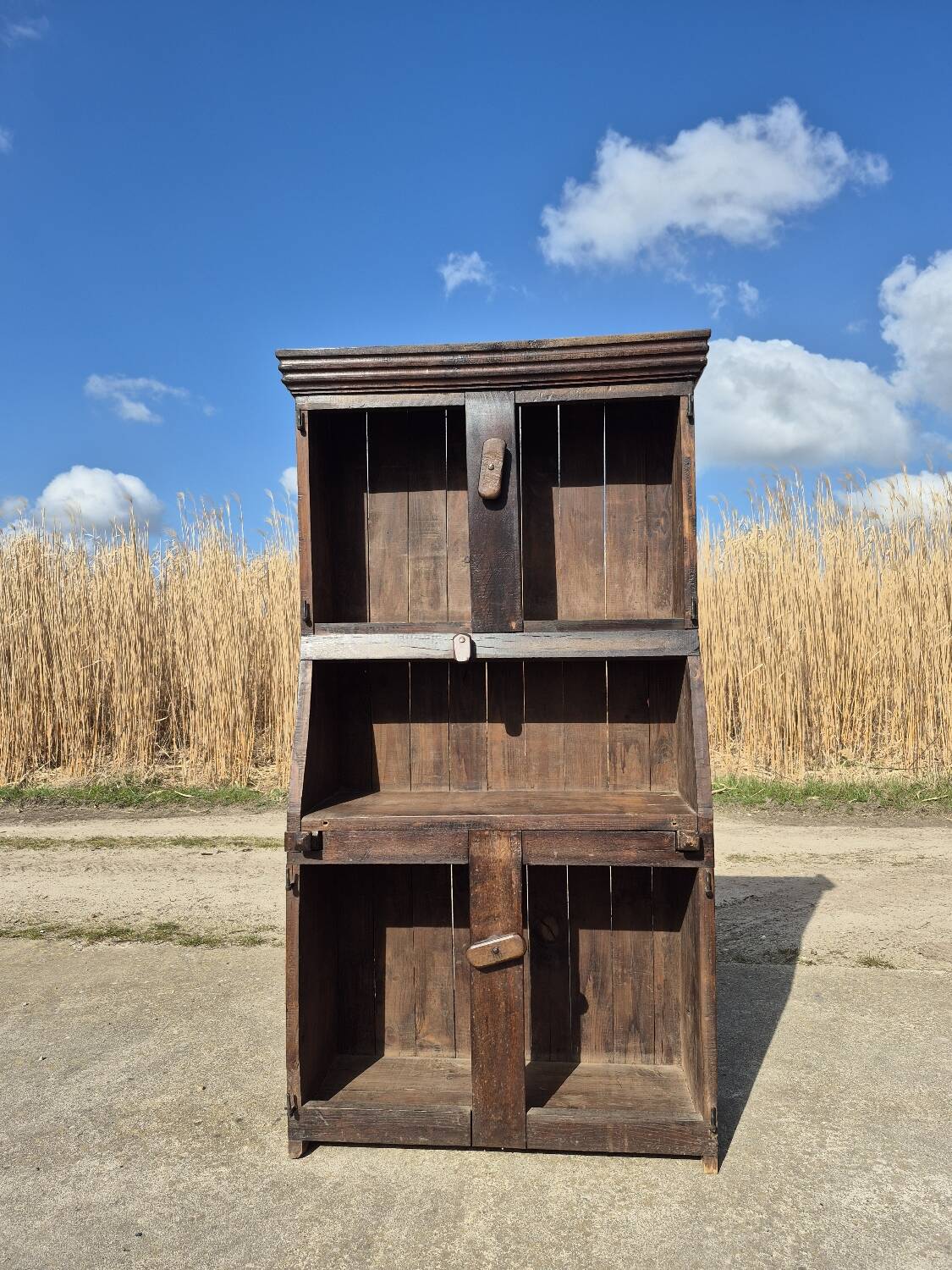 antique cabinet with carvings and wrought iron fittings rural