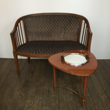 Old wooden and velvet bench