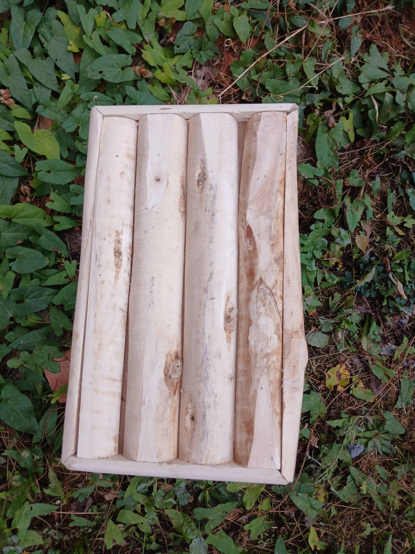 Small stool in raw wood