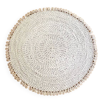 Large woven vegetable fiber placemat decorated with shells cowrie shells Bali
