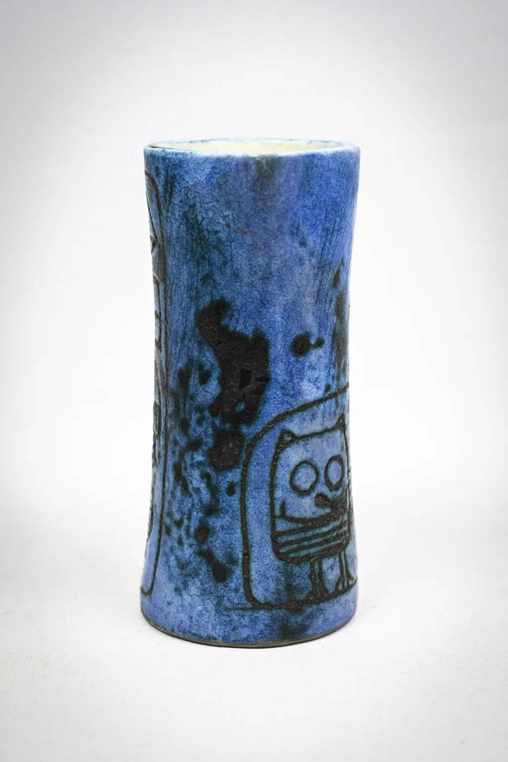 Small jug by Jacques Blin in blue ceramic with engraved animal decoration.