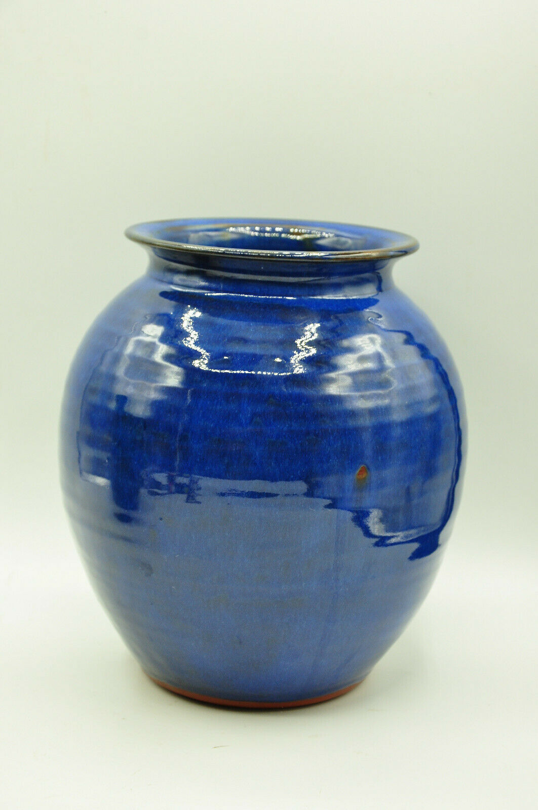 Blue enamelled terracotta vase signed to identify contemporary design collection