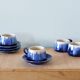 Service of 4 blue ceramic cups and saucers from the 1950s