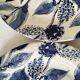 Two flat plates in earthenware with blue floral decoration.