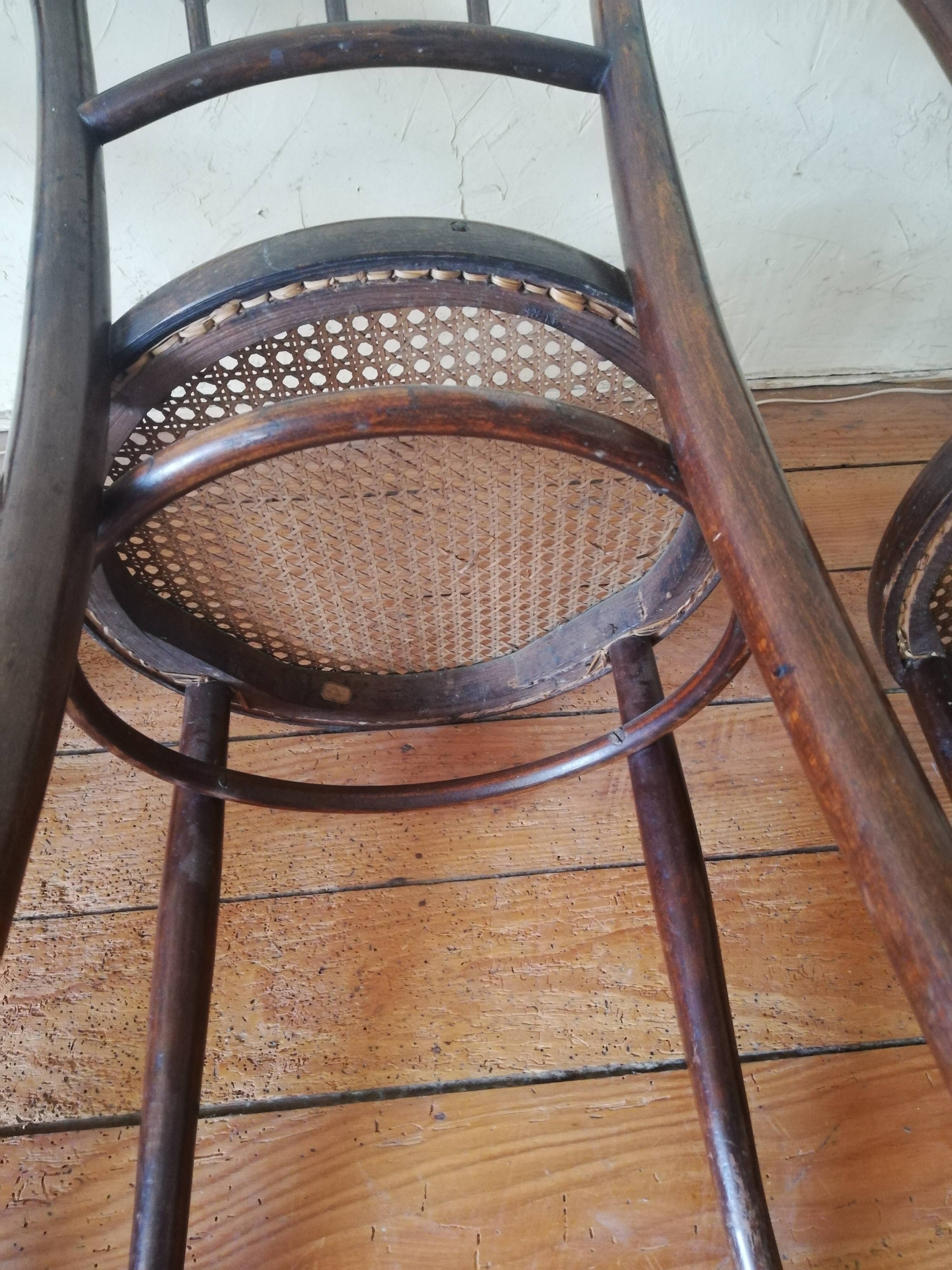 Old curved wooden bistro chairs