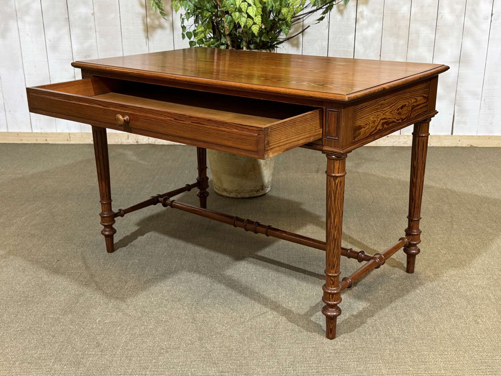 Desk table from the early 20th century in pitch pine.