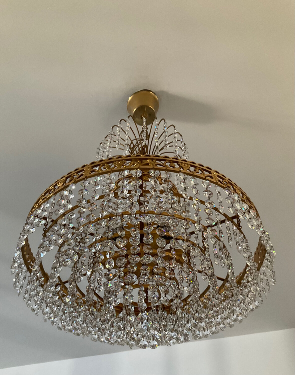 Cascade chandelier with crystal and bronze tassels