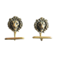 Pair of brass lion head patères