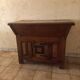 Old solid wood dough mixer carefully transformed into a bar cabinet.