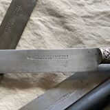 Set of 12 19th century table knives with ebony and chiseled silver handles