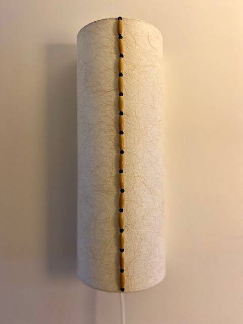 Long Japanese paper applique and bead cord.