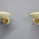 Pair of Czechoslovak Art Deco wall sconces from the 1940s in brass with opaline glass shades.