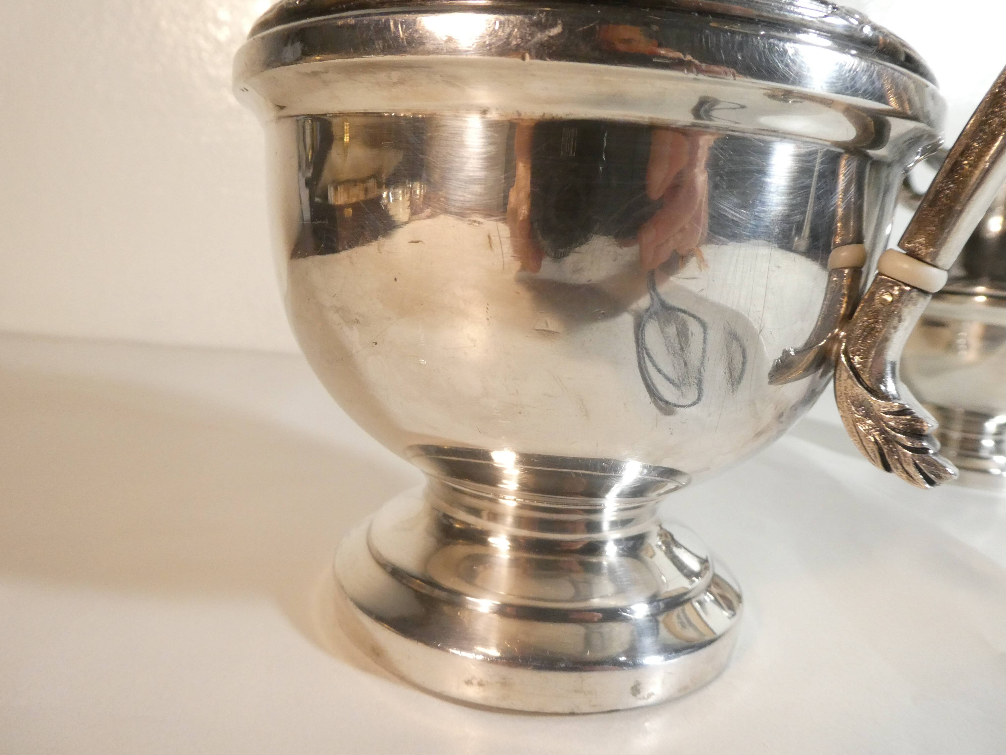 Louis XVI style silver-plated teapot and milk jug