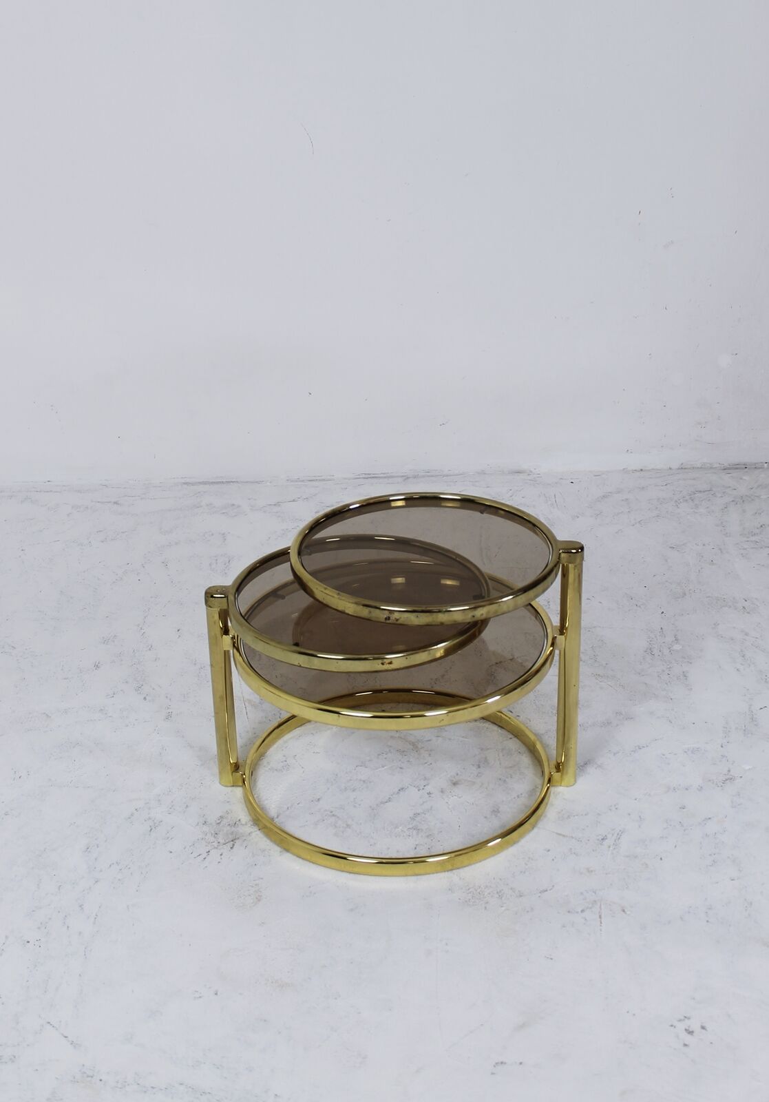 Mid century brass plated 3-tier swivel coffee table after Milo Baughman