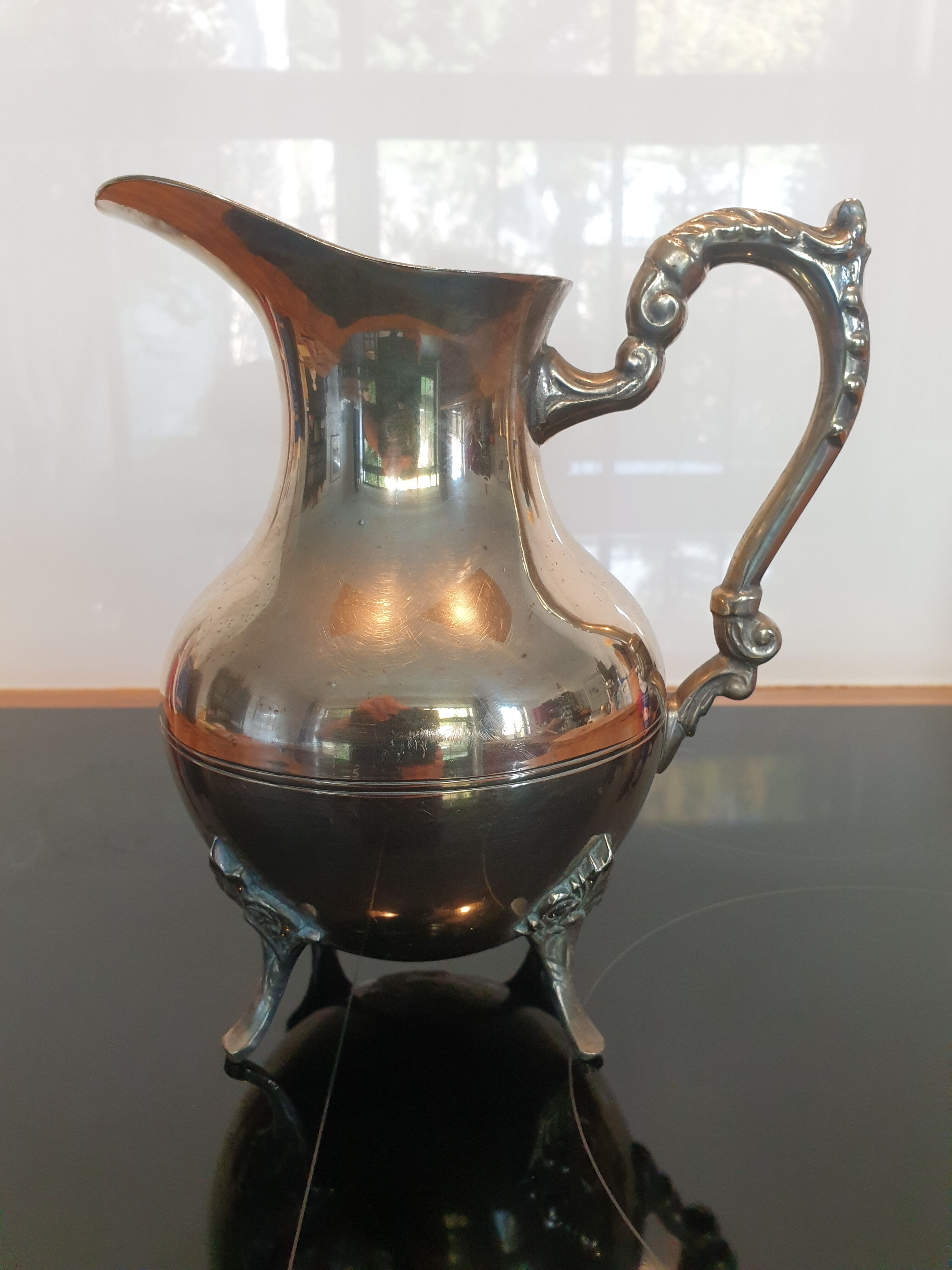 Silver metal pitcher