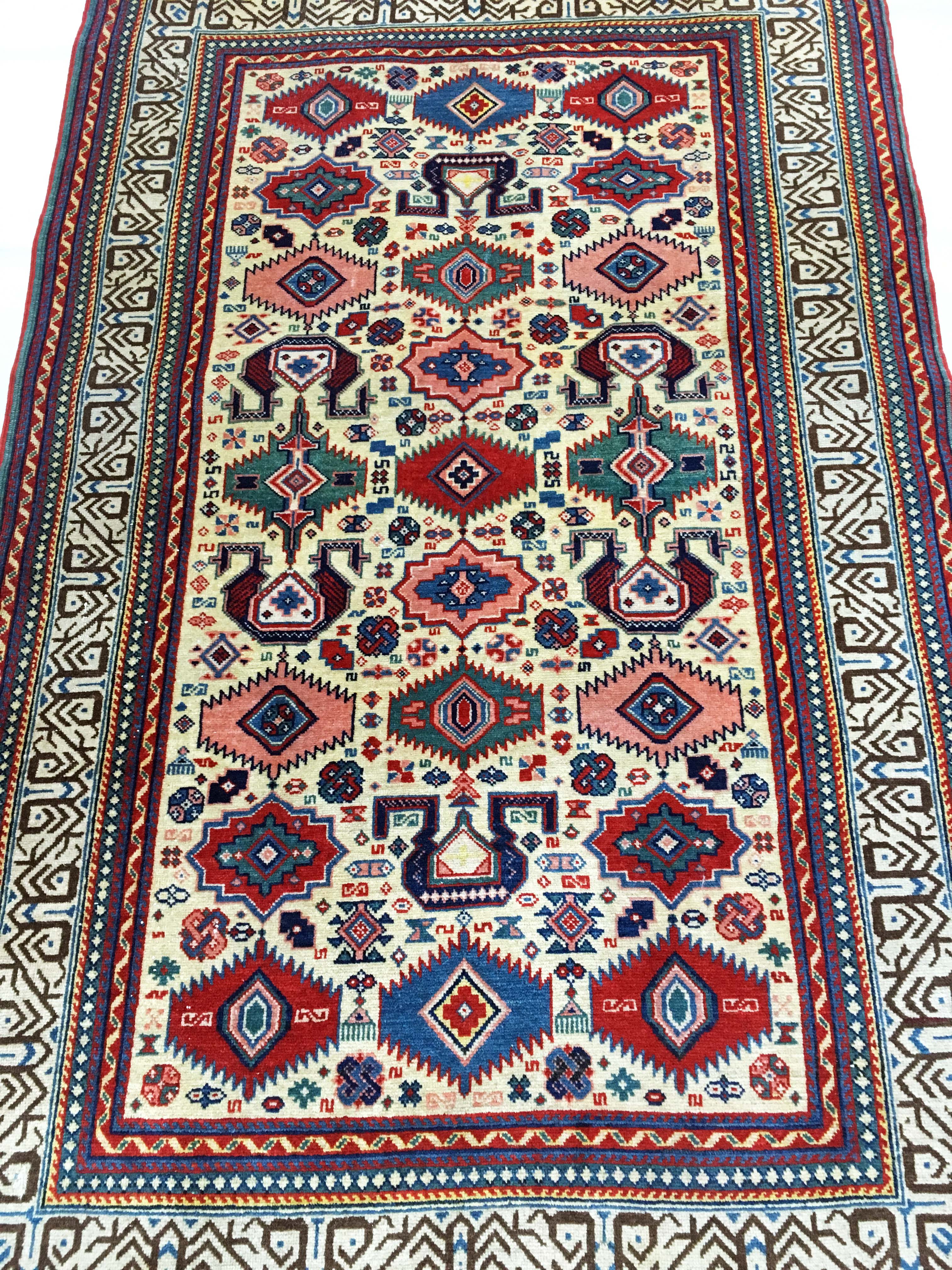Hand made oriental rug: former Shirvan Perepedil 180 x 110 cm around 1930.