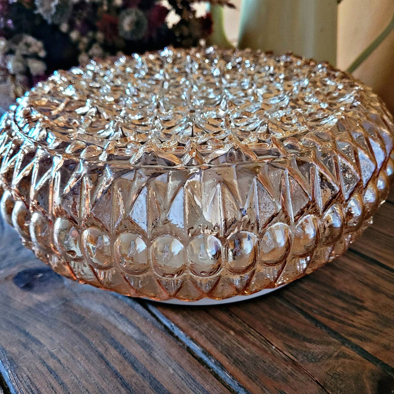 Large vintage ceiling or wall lamp in tinted molded glass with flower decoration