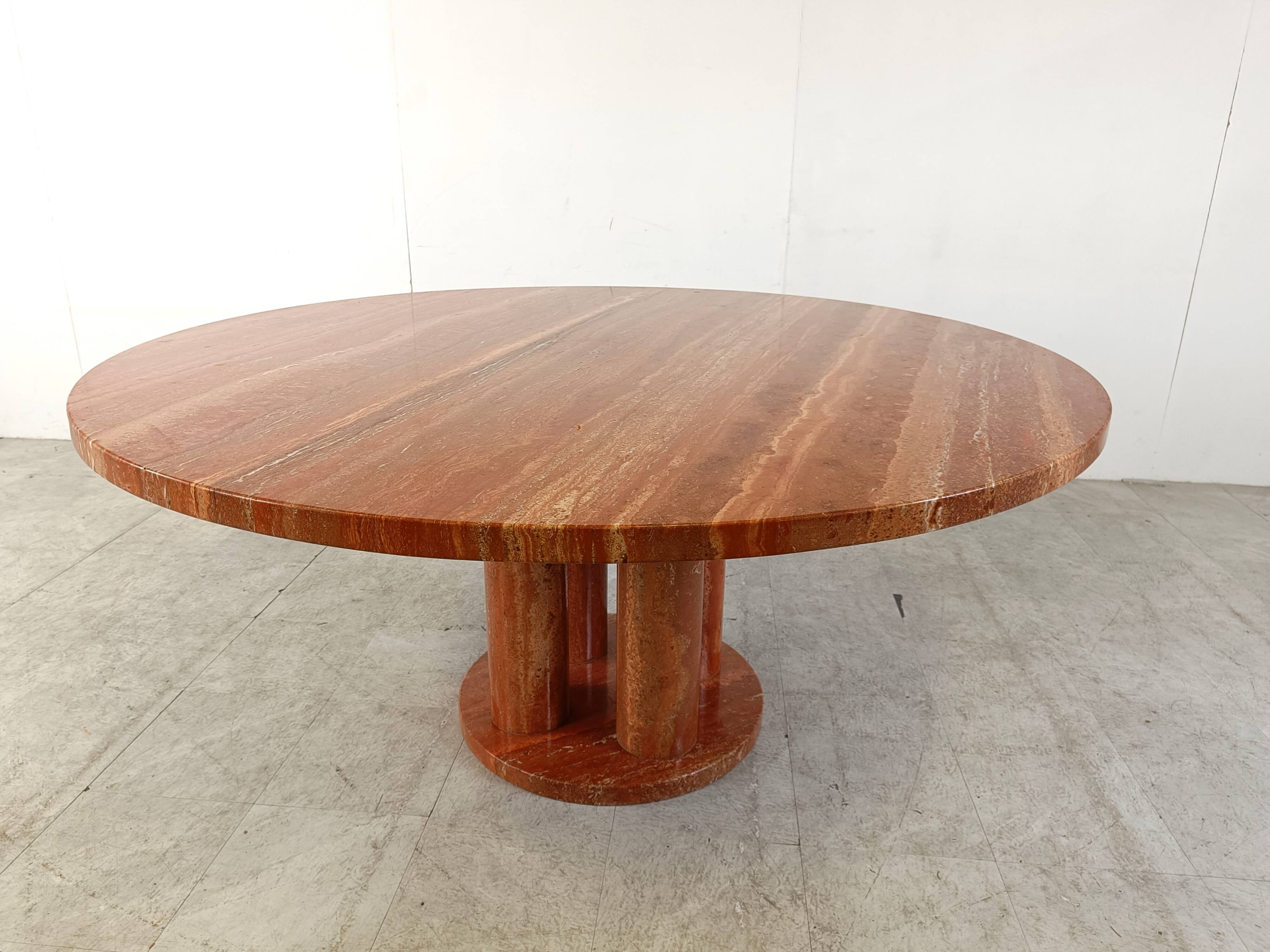 Large round red travertine dining table, 1970s