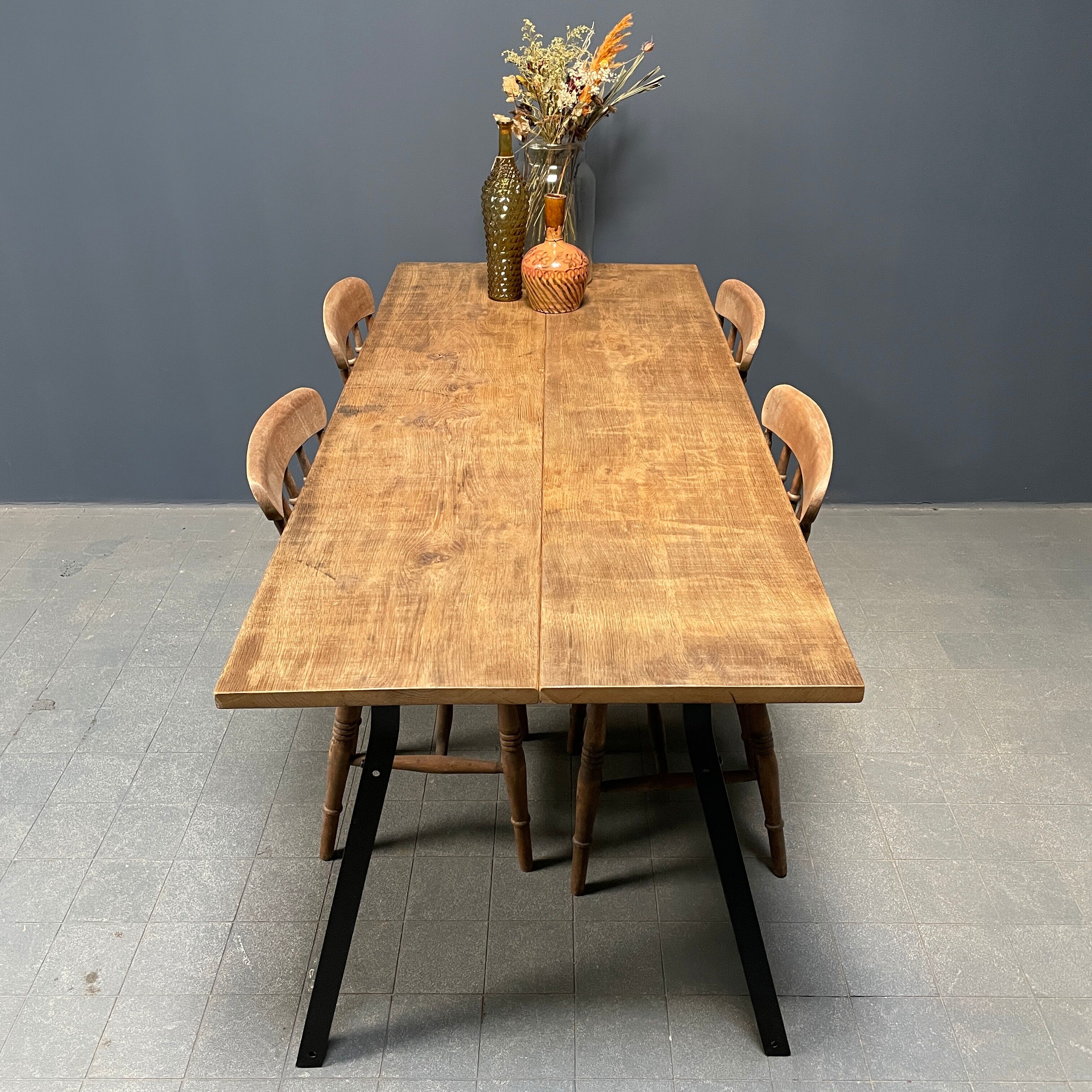 Handmade industrial oak dining table with black metal legs