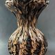 Vase signed in Murano Venice crystal with gold inclusion on a black background