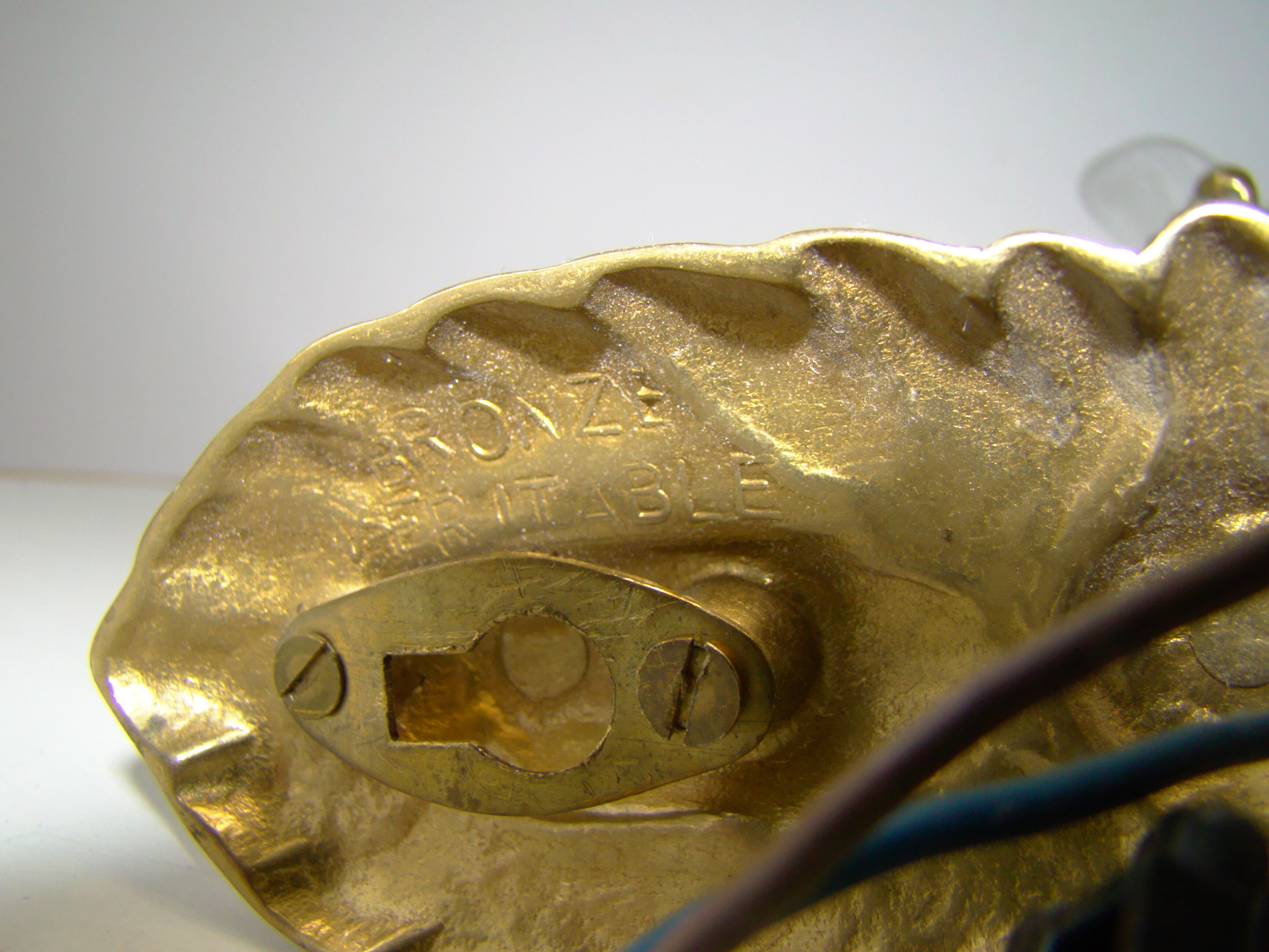 Pair of tanned sconces and glass paste