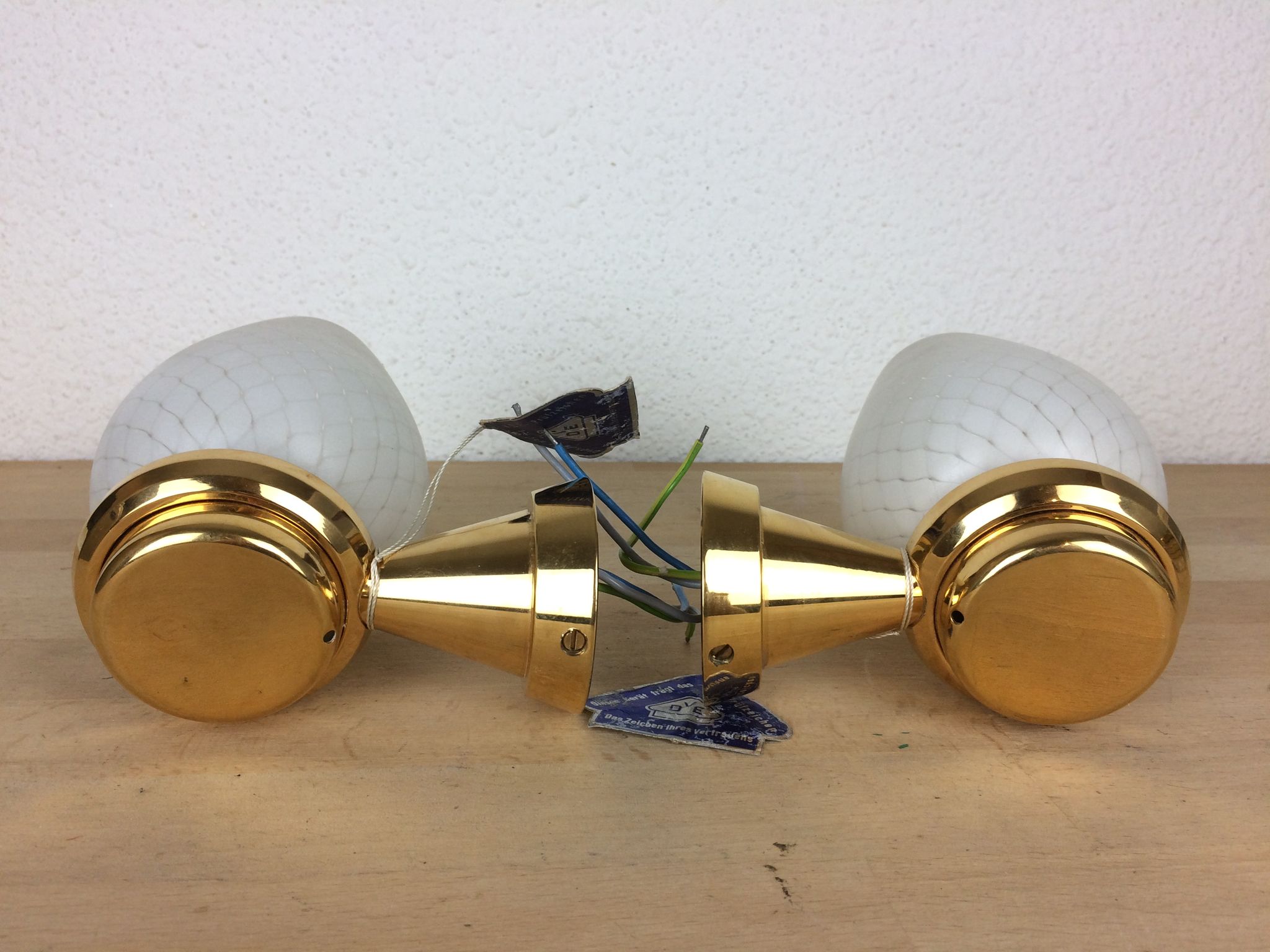Pair of solid brass and white opaline wall lamps