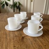 Espresso coffee cup service, Nestlé promotional items, in white glass.