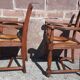 Pair of oak armchairs with straw seats and backs.