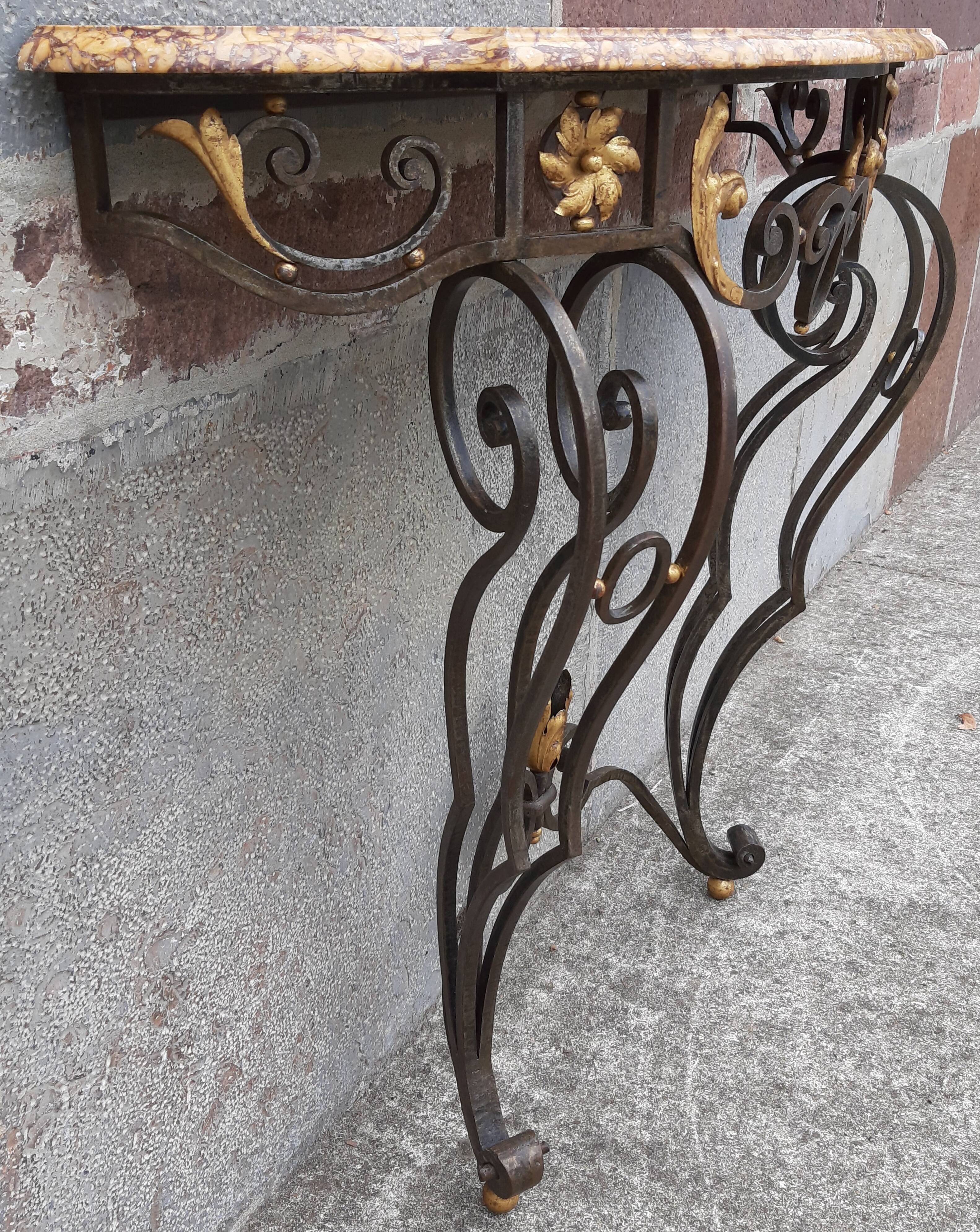 Console forged foot marble top