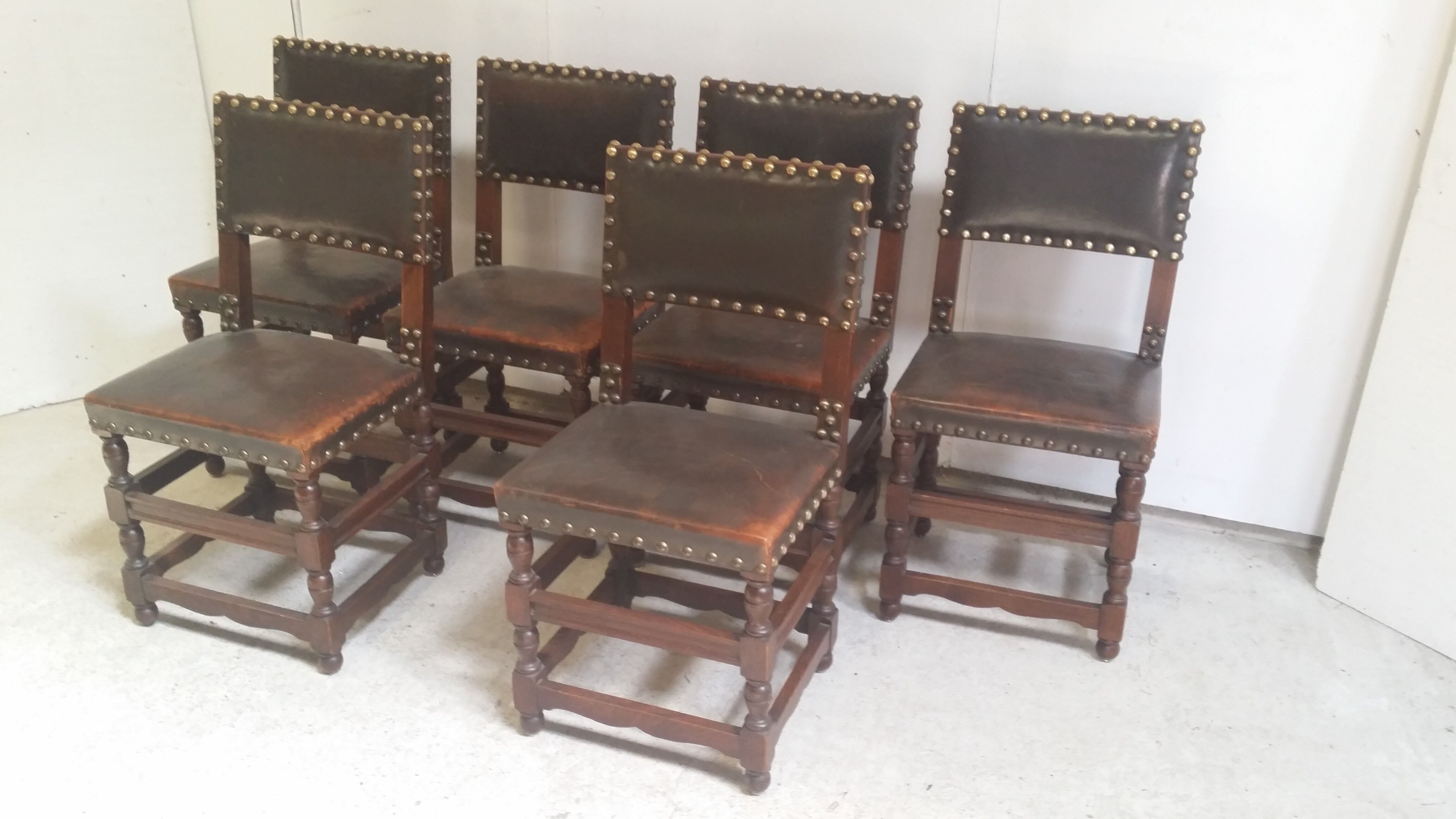 a set of six leather chairs and nails