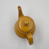 Yellow ceramic teapot