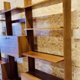 Modular wall-mounted bookcase in walnut