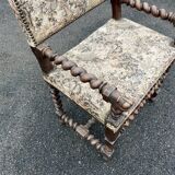 Louis XIII style armchair with twisted backrest and legs.
