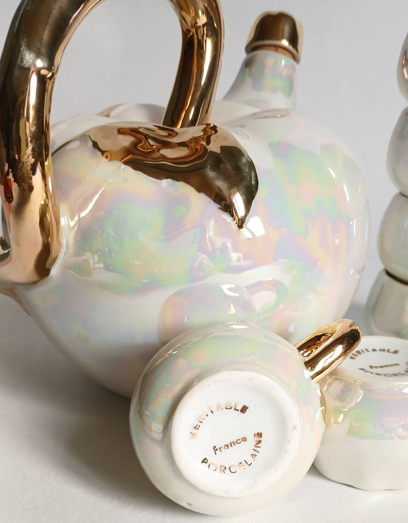 Fruit-shaped liqueur service in porcelain or tea set with its mirror tray.