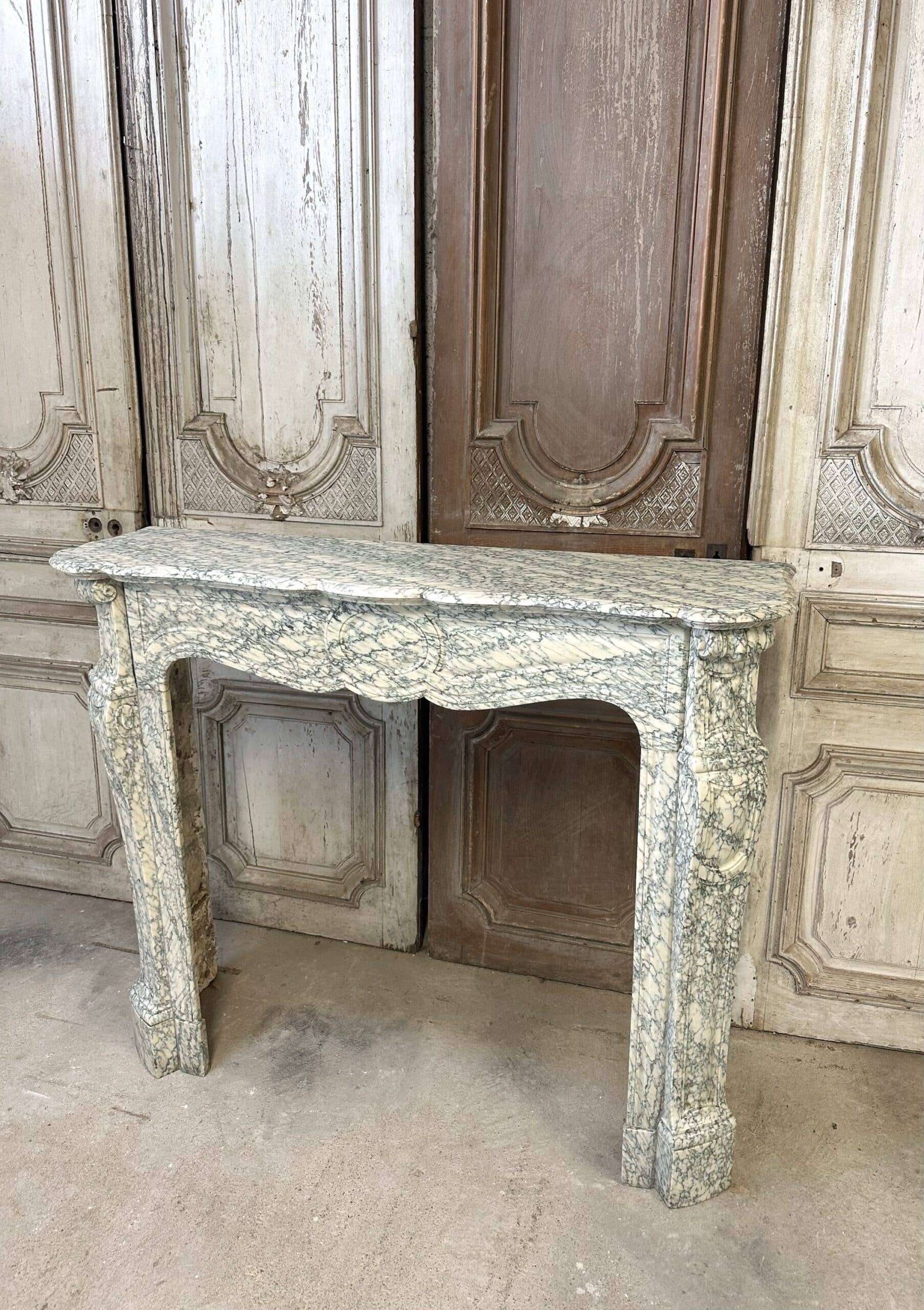 Cheminée en marbre vert style Louis XV