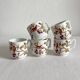 5 antique porcelain coffee cups decorated with birds